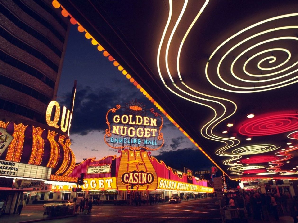 Glowing casino-style facade at dusk